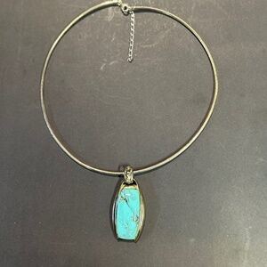 Necklace with a turquoise pendant
